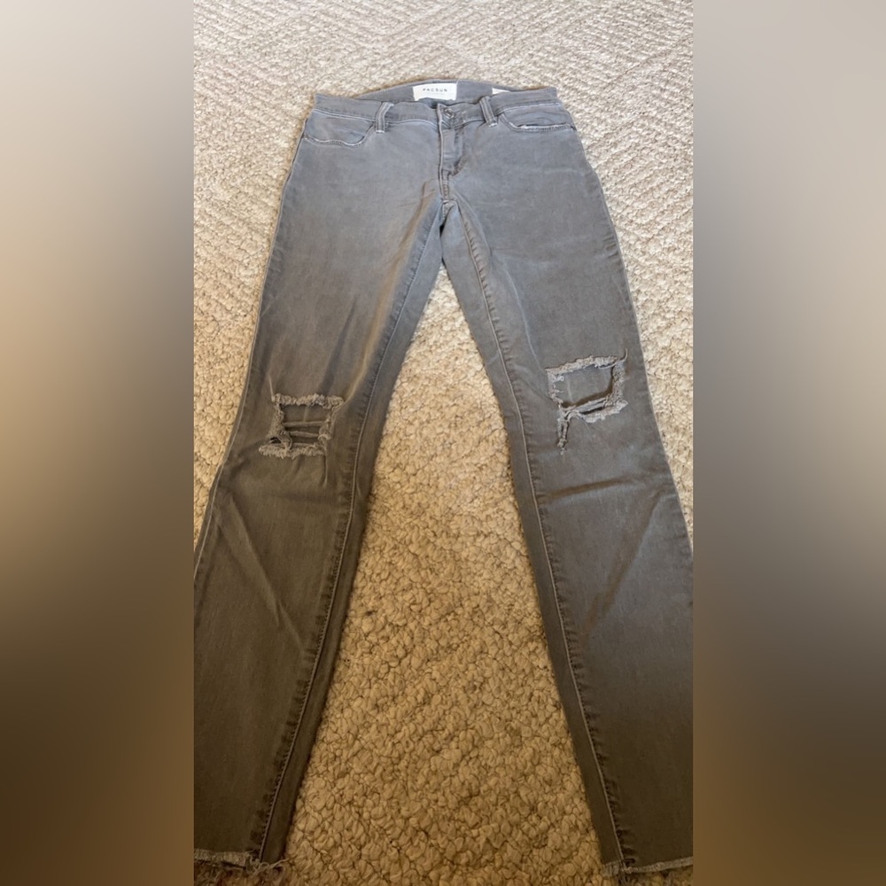 Grey ripped skinny jeans